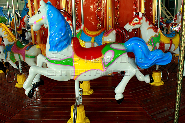 amusement park carousel ride with antique FRP horses